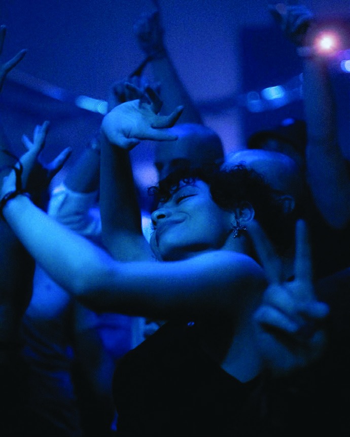 People sharing a gathering around music